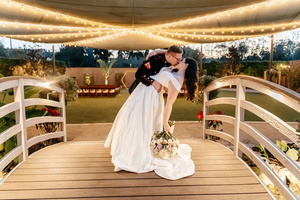 Couple dancing under string lights at a Temecula wedding